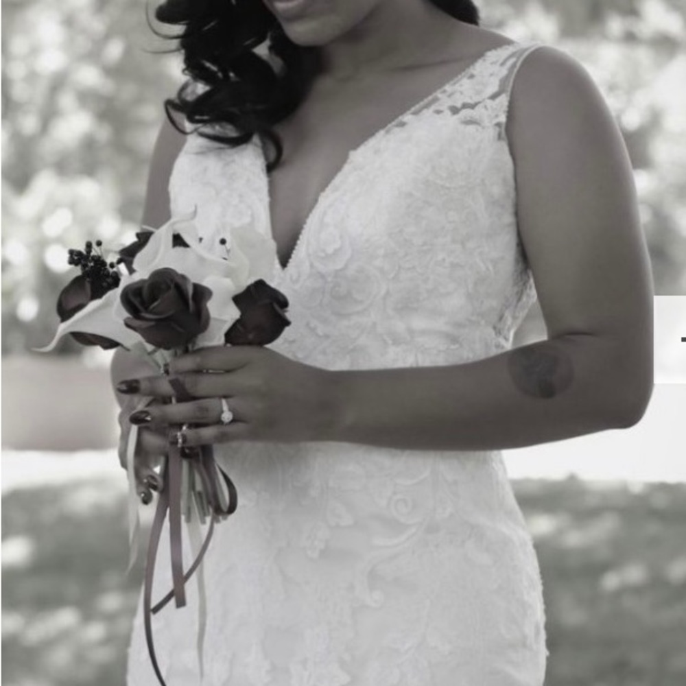 Pre-Owned Oceano Wedding Gown by White One.